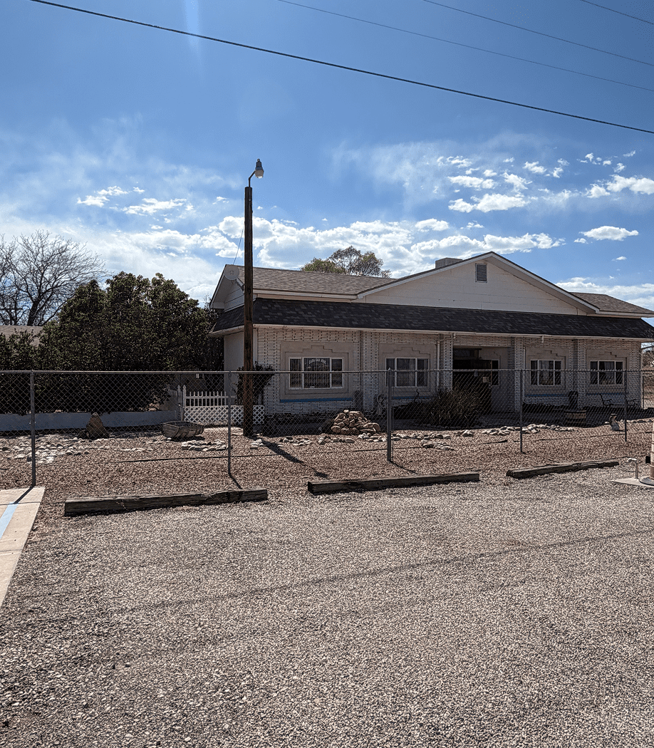 Single-story house with fenced yard