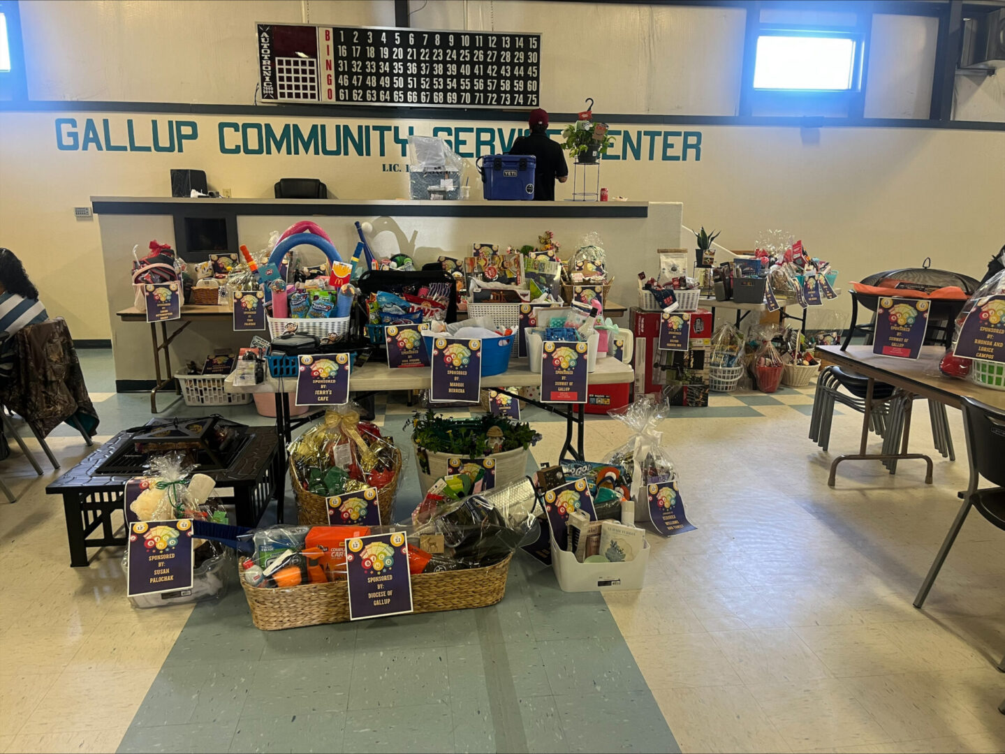 Assorted gift baskets displayed in community center